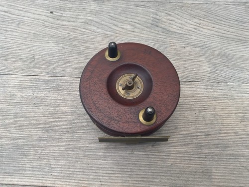 Old wooden fishing reel brass - old,