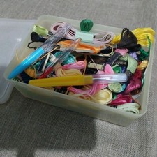 Bundle Of Anchor Cross Stitch Skeins in tub + stitch unpickers