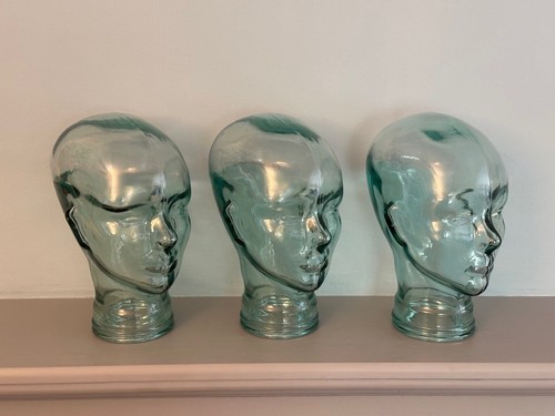 Three glass heads - glass,