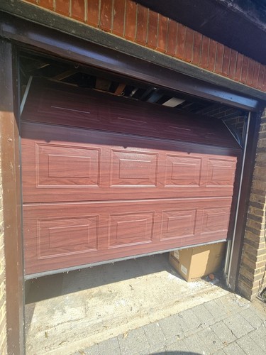 Used brown woodgrain sectional - woodgrain,