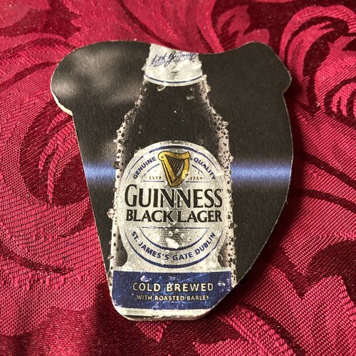 Guinness black lager - black,