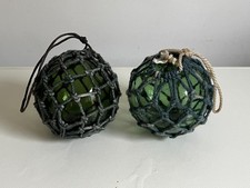 2  vintage glass fishing net