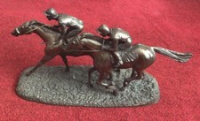 HEREDITIES SCUPTURE OF "FLAT OUT" SIGNED D.GEENTY 