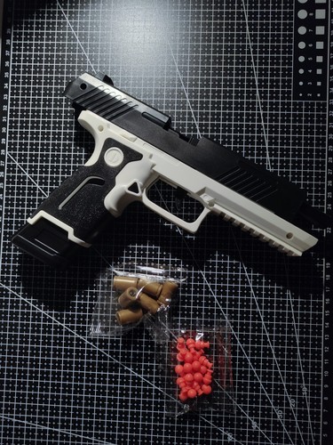 P32 shell ejecting toy pistol - toy,