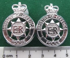 Pair of Ministry of Defence Police collar badges