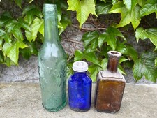 Three antique glass Bottles.