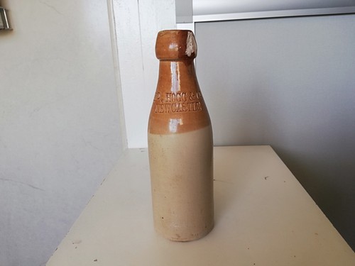 Antique stoneware beer bottle