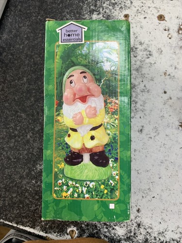 Garden gnome holding - holding, hand