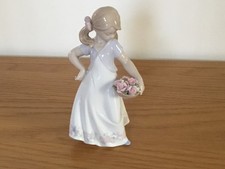 JULIANA COLLECTION (GIRL i/c BASKET OF FLOWERS