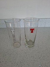 2x Tennent's Lager One Pint Beer Glass Used.  One with ICE COLD brand