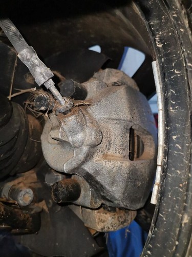 1159567 brake caliper left