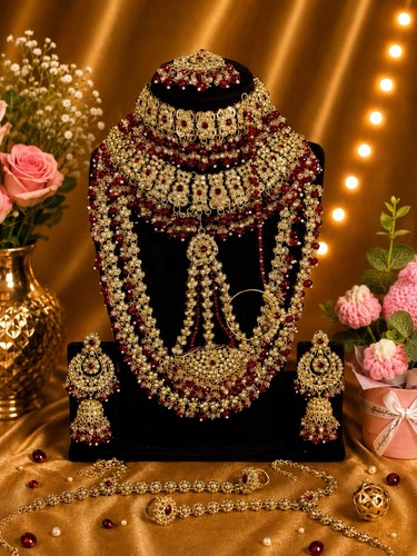 Gold tone maroon crystal asian - gold,
