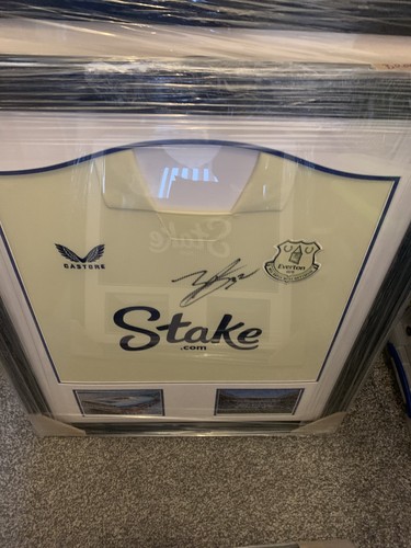 Everton signed and - signed, away