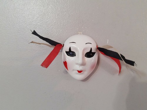 Wall hanging face mask hand - wall,