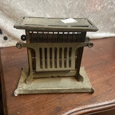 Antique toaster the universal - toaster,