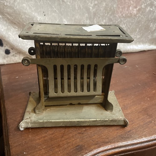 Antique toaster the universal - antique,