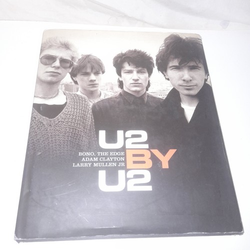 Hardback book - by, u2