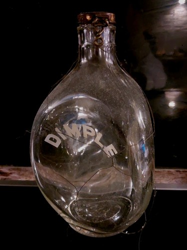 Empty dimple whiskey bottle - whiskey,