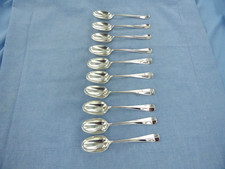 A VINTAGE SET OF TEN STERLING