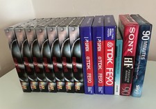 Job lot of 12 sealed blank cassettes and a DVD+RW tape.
