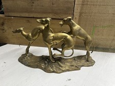 Antique brass racing dogs 