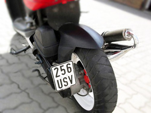 License plate holder side