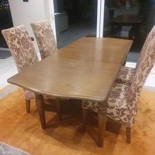 Extendable Solid dark Wood Dining Table  and 4 chairs used