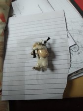 ceramic sheep playing bagpipes make mark K