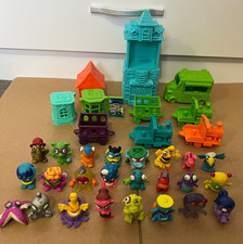 Bundle of Zomblings Figures Houses Vehicles Magic Box International Toys