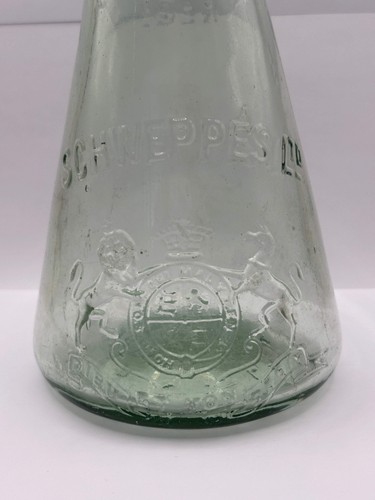 Old large advertising bottle