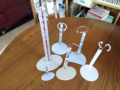 Assorted doll stands - 6, x