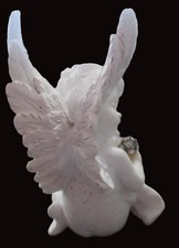 Naked sleeping white cherub