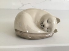 Quail Pottery sleeping cat