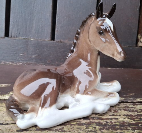 Horse foal figurine lying - figurine, down