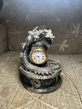 A stunning Myth and Magic Tudor Mint Dragons clock perfect working order