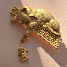 Vintage Golden Cat Catching