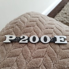 Vespa P 200 E Side Panel Badge Pins 105mm Apart Black and Alloy 001311