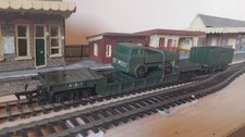 OO gauge Tri-ang WD Well wagon with Lorry Load + Drop Side Mineral Wagon.