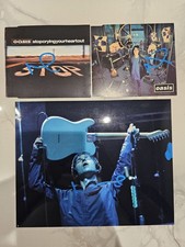 Oasis signed cd covers and 10