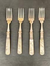 antique set of four silver hallmarked desert forks with Mother of pearl handles