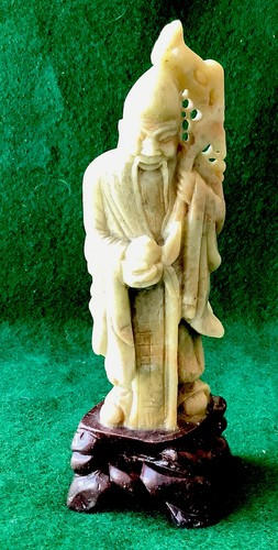 Hand carved green stone - in,