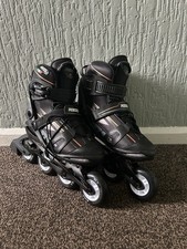 Black Roces Brand Inline Skates with Orange Accents Size UK 7