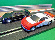 1:43 Slot Cars Silver Mercedes CLK GTR & Nissan Skyline With Lights (tested)