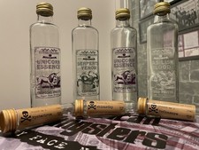 The Potions Cauldron. Set of 7 empty bottles