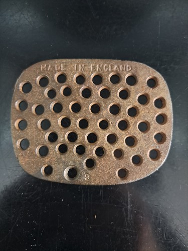 Antique cast iron trivet - no,