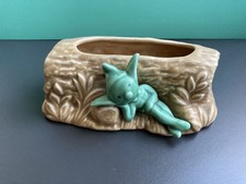 Vintage Sylvac Pixie and log