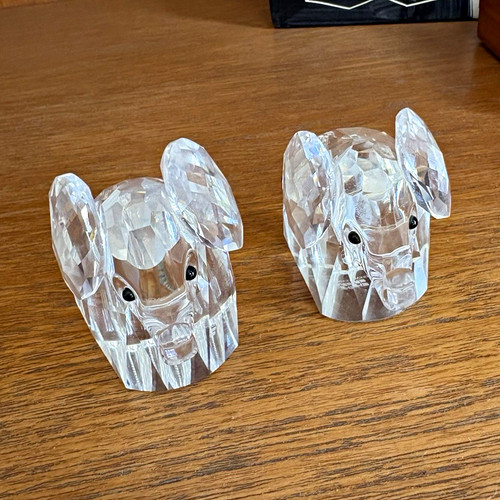 Pair clear faceted crystal - of,