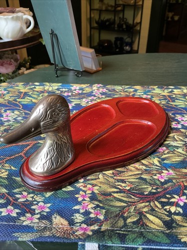 Vintage brass duck - head, wooden