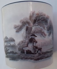 MUG WITH IMAGE OF MAN STTING