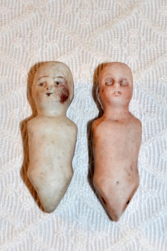 Two antique bisque doll - two,
